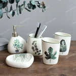 ensemble vaisselle salle bain blanc motifs floraux moderne distributeur savon tasses dents bol savon