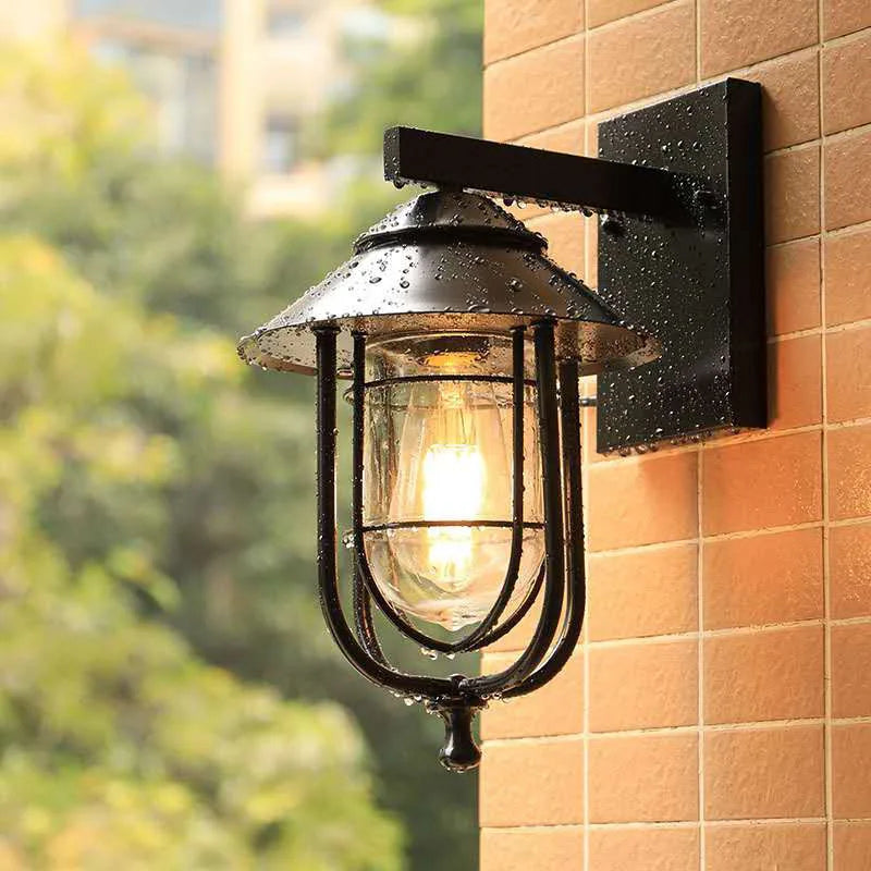 lampe murale vintage industrielle cage métallique verre transparent noir fixée mur plaque fixation