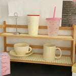 étagère deux niveaux bois clair moderne rangement cuisine tasses vases figurines serviettes biscuits assiettes