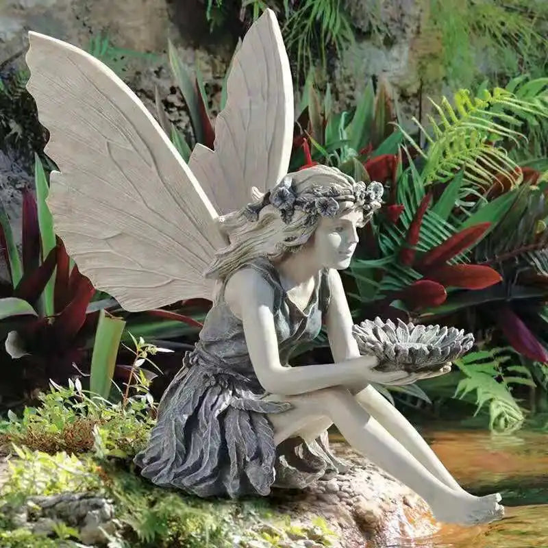 statues fées jardin extérieur résine vert gris blanc ailes translucides robe feuillue classique romantique