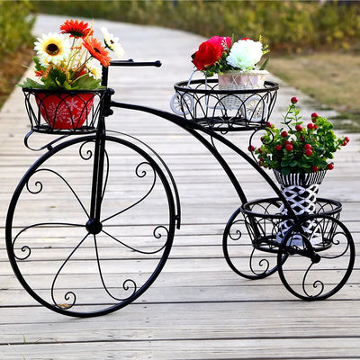 Support de fleur vélo en fer forgé rose
