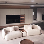canapé salon moderne tissu beige vert olive chesterfield coussins table basse