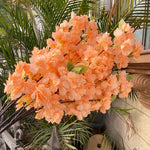 décoration intérieure branches fleurs artificielles cerises roses vertes mariage anniversaire