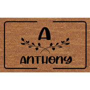 tapis personnalisé marron noir texture coco alphabet nom famille porte entréeintérieur