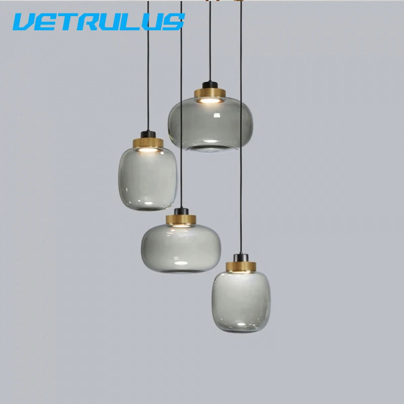 suspension lumineuse moderne transparente dorée ampoule câble noir minimaliste salle manger chambre