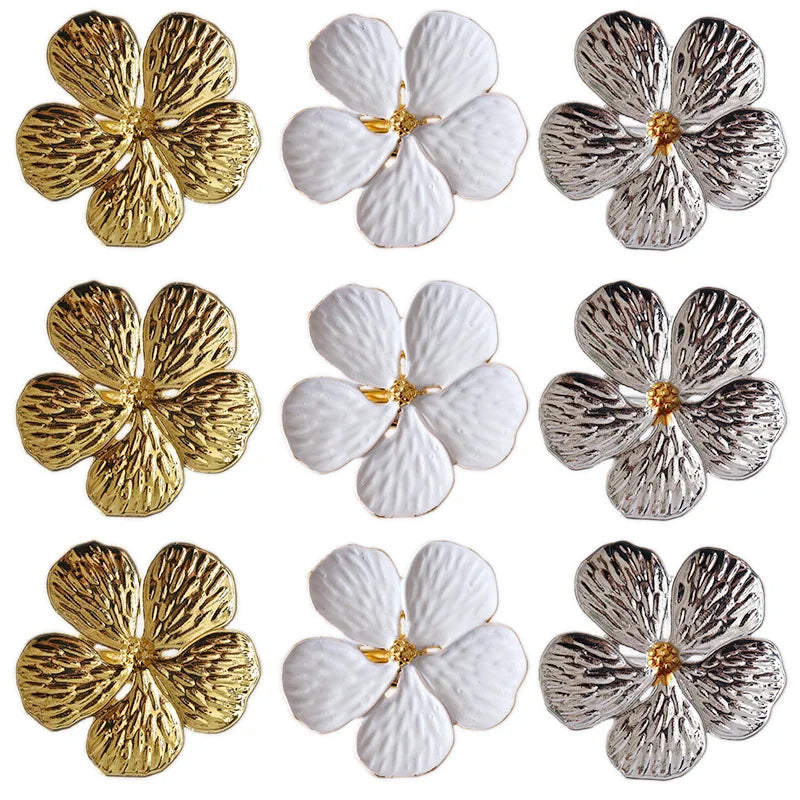 anneaux serviette métal fleur stylisée pièces doré argenté blanc élégants modernes respectueux environnement