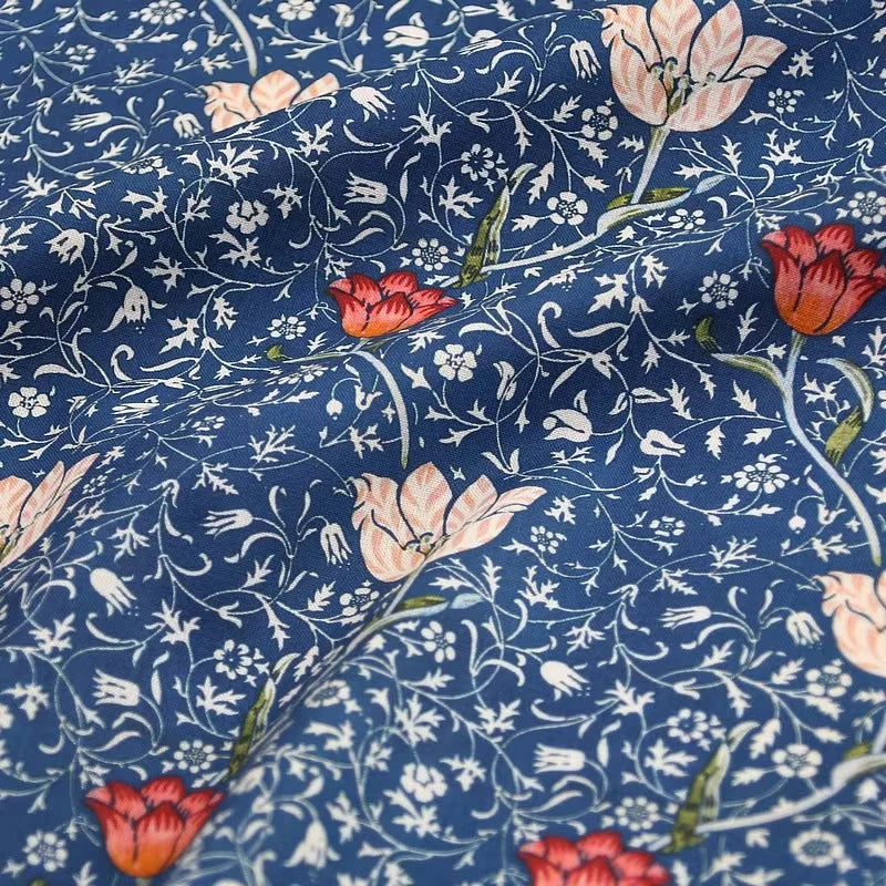 tissu coton imprimé floral motifs fruits pommes citrons couleurs vives noir bleu turquoise orange