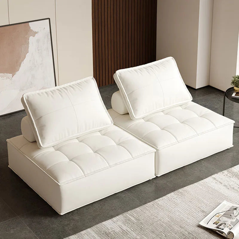 canapé lit moderne cuir noir blanc marron oreillers minimaliste salon