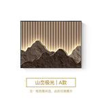 cadre mural contemporain noir montagne relief lignes lumineuses minimaliste fixations murales decoration interieur