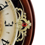 horloge murale bois doré motif floral vintage classique fixation decoration maison