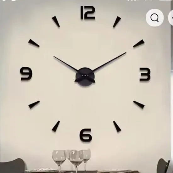 horloge murale moderne blanc doré plume stylisée sans LED fixation sans éléments visible