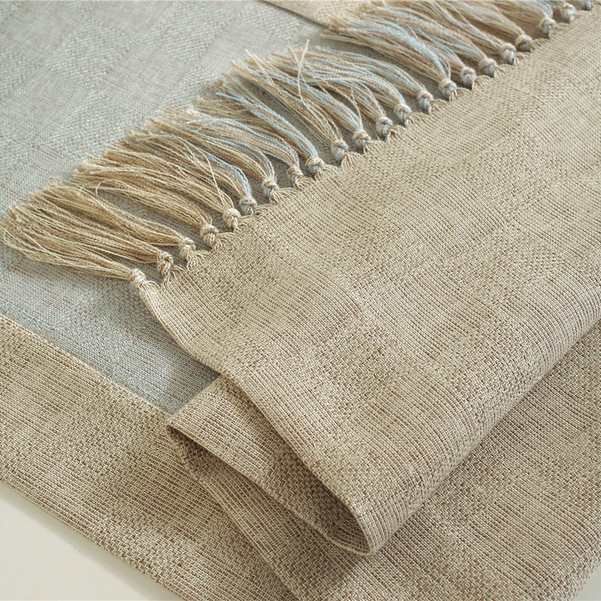 nappe tissée franges scandinave minimaliste gris beige vertebranches verte plante verte pot artwork encadré