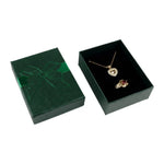 boîte rangement bijoux or rouge argent noir brillants rubis classique élégant pendentifs fermeture éclair