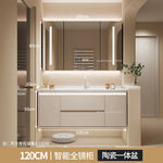 meuble salle bain moderne évier tiroirs beige clair miroir lumineux tapis motifs cosmétiques dorés
