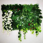 plantes artificielles vertes feuilles variées fruits rouges extérieures accrochées décoration naturelle maison exposition