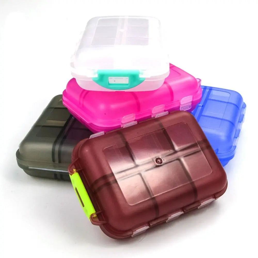 boîte pilules transparente pratique blanc rose gris bleu compartiments poignée rouge compact echangement daily
