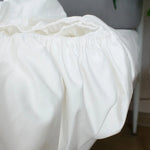 draps lit blancs satinés king size boutonnés complet moderne ecofriendly