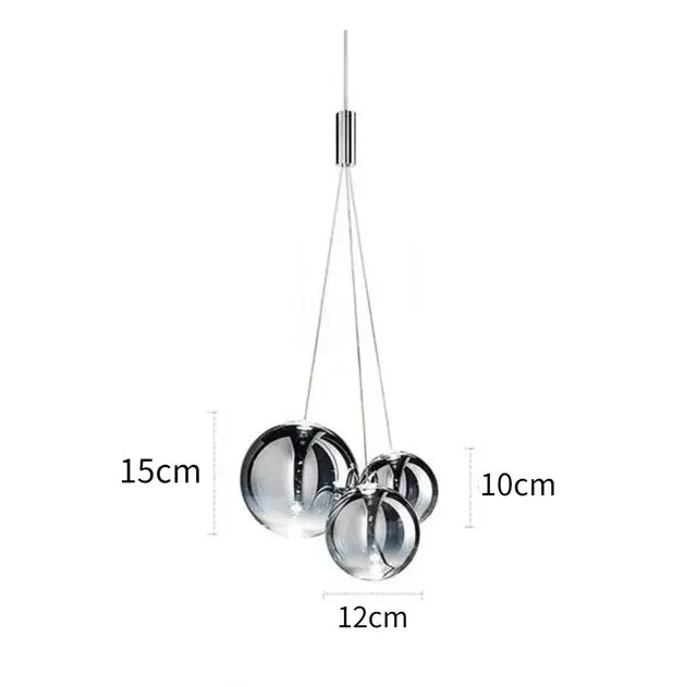 suspension lumineuse moderne sphères brillantes or argent transparentes chambre salle manger