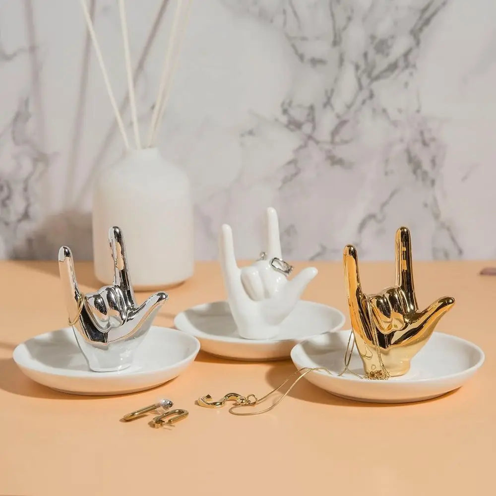 support bijoux main stylisée or argent rose gold blanc moderne