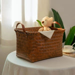 panier rangement rotin tissé marron clair brodé chien rustique poignées cuir décoration maison