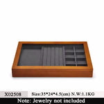 boîte rangement bijoux bois gris foncé classique motif géométrique opacité adhésif plaque cuir anniversaire