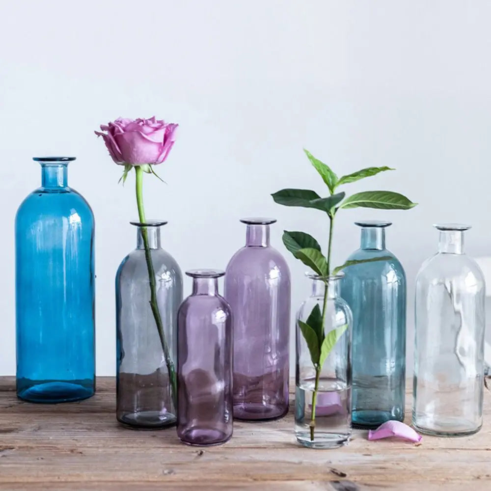 bouteille verre transparent moderne fleurs artificielles décoration table salon mariage nordique