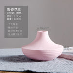 vases modernes céramique rouge bleu vert jaune rose rayures horizontales