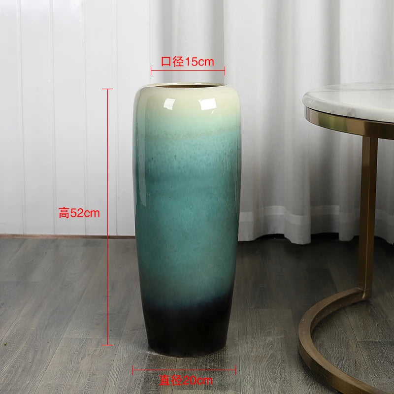 Vase décoratif cylindrique en céramique émaillée vert dégradé de 52 cm de hauteur avec un diamètre de 15 cm.