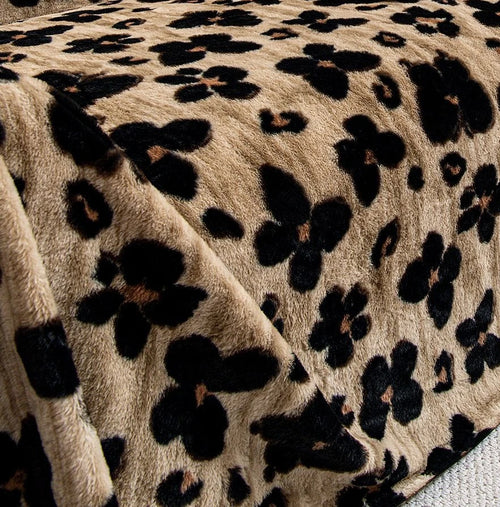 couverture canapé imitation fourrure léopard beige noir moderne salon décoration hiver confortable grande taille