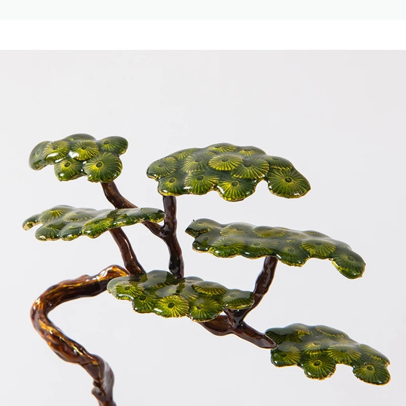 sculpture d'art moderne bronze feuilles vert texture métallique base carrée noire minimaliste