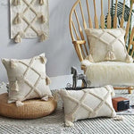 coussin carré beige motif losange texture bouclée décoration maison boho franges