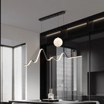 suspension lumineuse moderne ondulée globe lunaire noir blanc beige