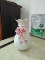 vase porcelaine céramique fleurs relief blanc classique moderne décoration table