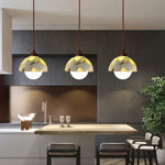 Suspension lumineuse moderne pierre texture granulée blanc marron beige gris câble suspendu chambre salon