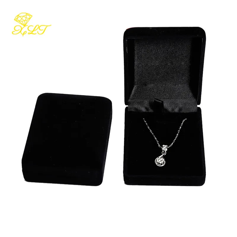 boîte rangement velours collier plume élégant classique pendentif plume argenté emballage sécurité transport bijoux