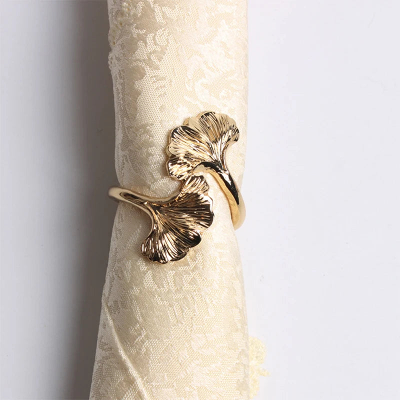 boucles serviette métal feuilles gingko or cuivre classiques mariage décoration table élégante anniversaire événement