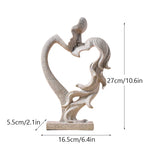 statuette moderne couple enlacés forme cœur résine blanche dorée argentée romantique decoration interieur base