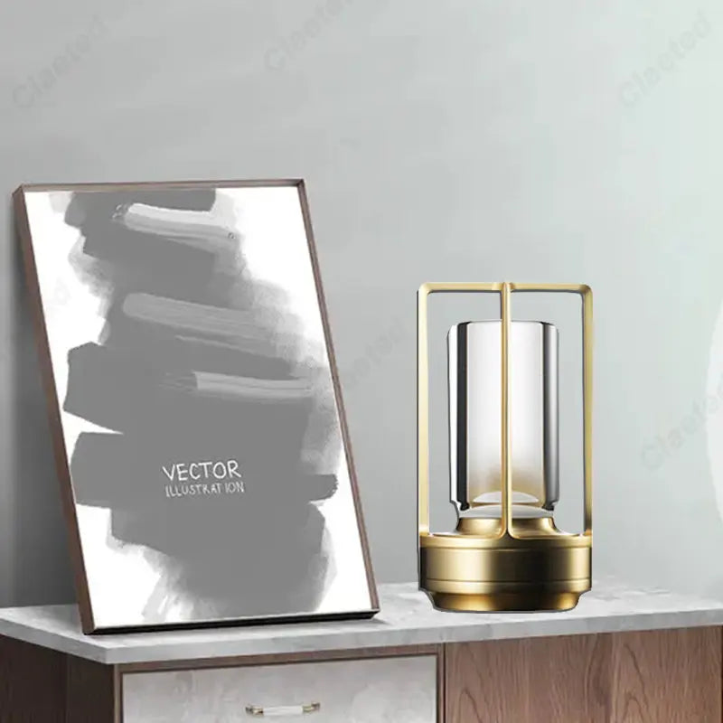 lampe torche moderne led transparente noir doré base métallique minimaliste lumière ambiance camping restaurant