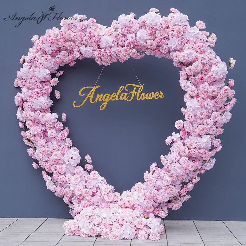 Arche fleurs rose romantique décoration extérieure mariage anniversaire événement table