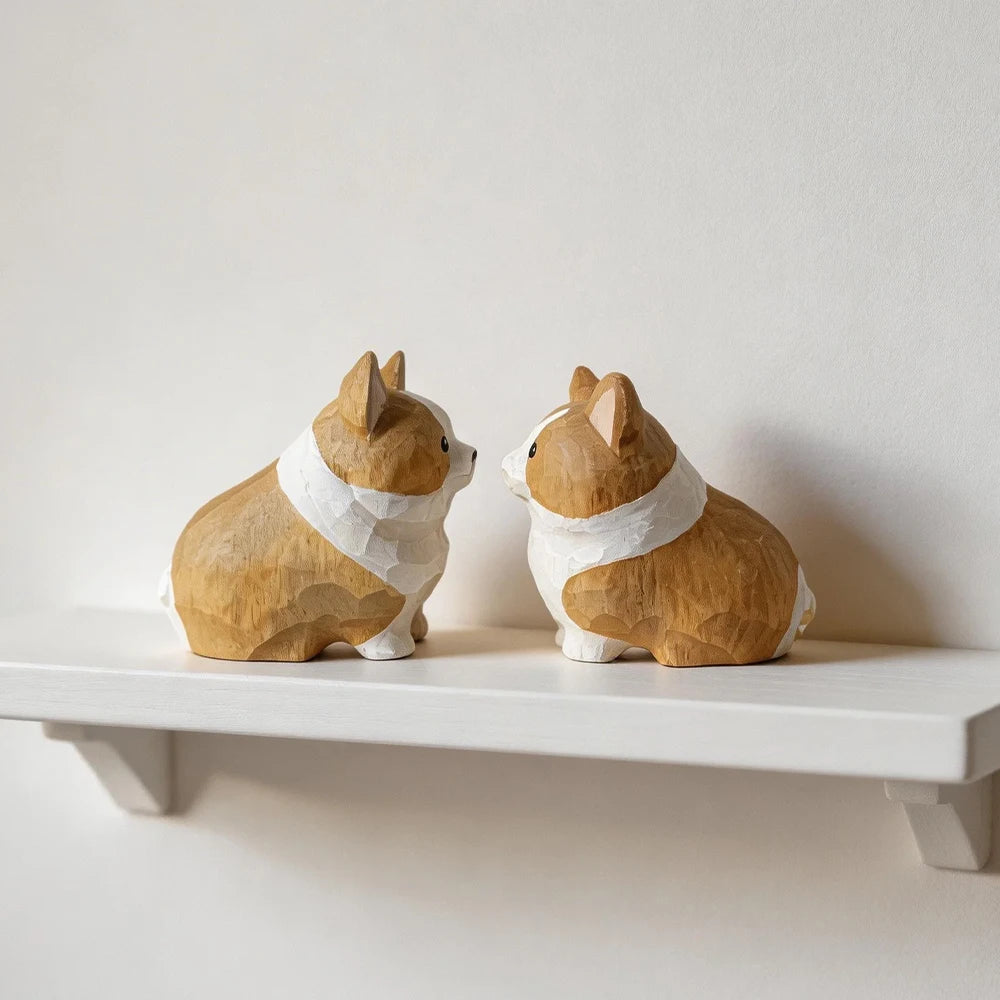statue chien corgi bois artisanal marron clair blanc geometrique anneau chainette chambre deco noel
