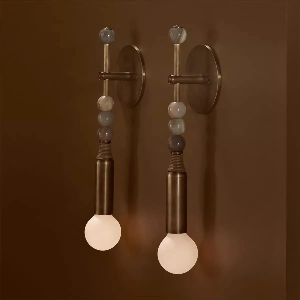 lampe murale moderne élégante bronze marbre finition métallique blanc gris noir