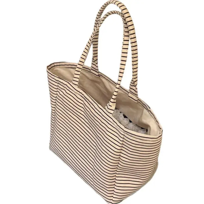 sac main blanc noir rayures horizontales poignées détachables intérieur beige casual