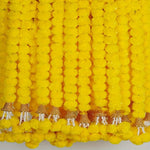 guirlande fleurs artificielles jaunes oranges décoration événement festive indienne lumière led