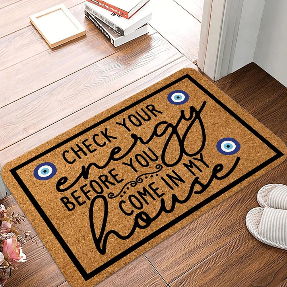 tapis d'entrée moderne lettrage stylisé anti dérapant résistant rides marron clair noir bleu blanc