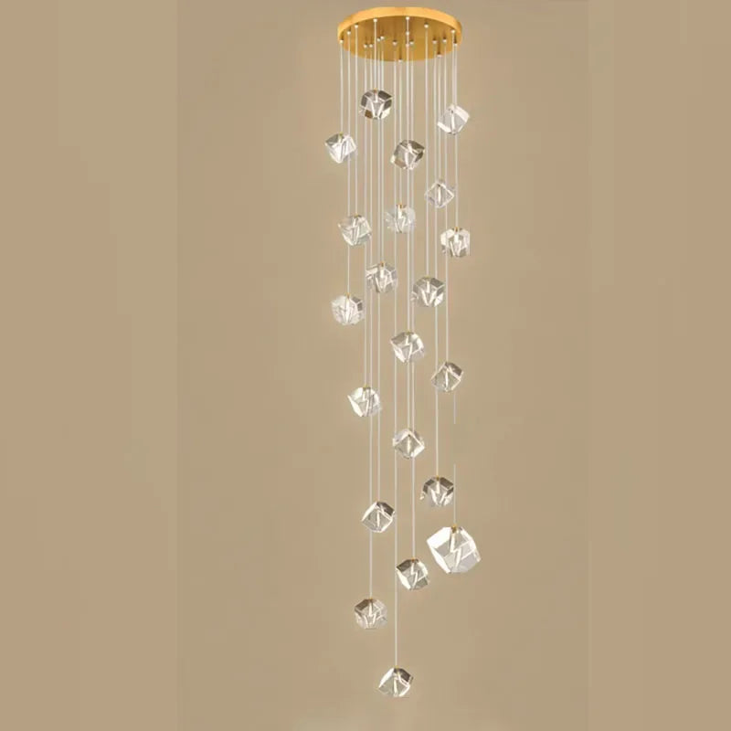 suspension lumineuse moderne transparente dorée facettes géométriques élégantes multiples lampes