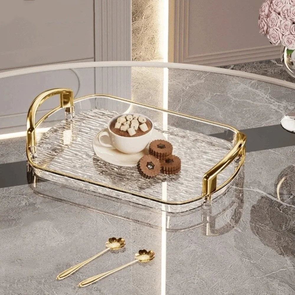 plateau rectangulaire moderne élégant poignées métalliques transparent doré texture marbrée bijoux parfums tasses