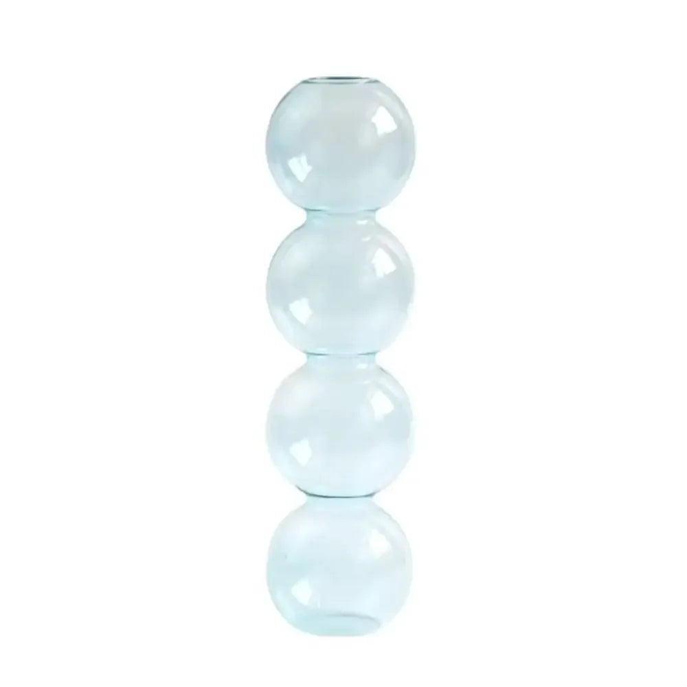 vase moderne transparent sphères empilées jaune clair rose bleu vert brun