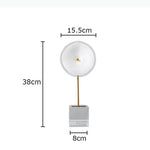 décoration moderne lampes sculpturales transparentes abatjours texturés base cube doré blanc chambre