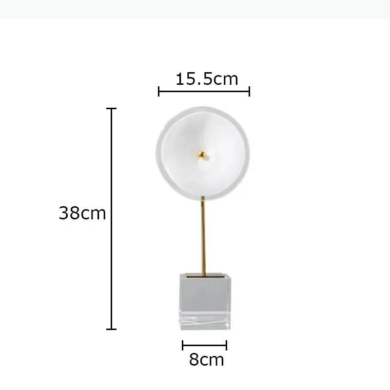 décoration moderne lampes sculpturales transparentes abatjours texturés base cube doré blanc chambre