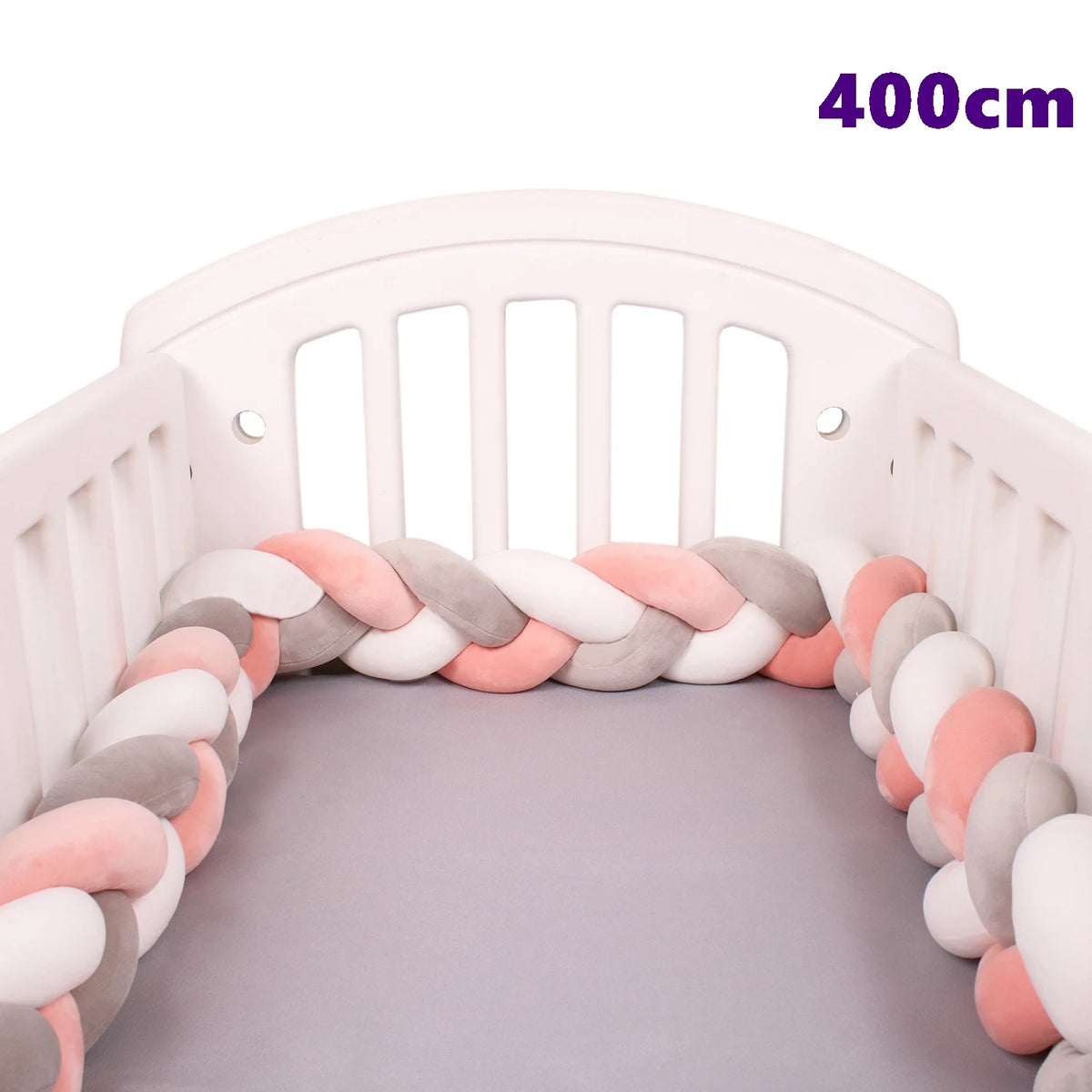 coussin noué bébé tissu doux texture tressée beige clair moderne confortable sécurité chambre anti